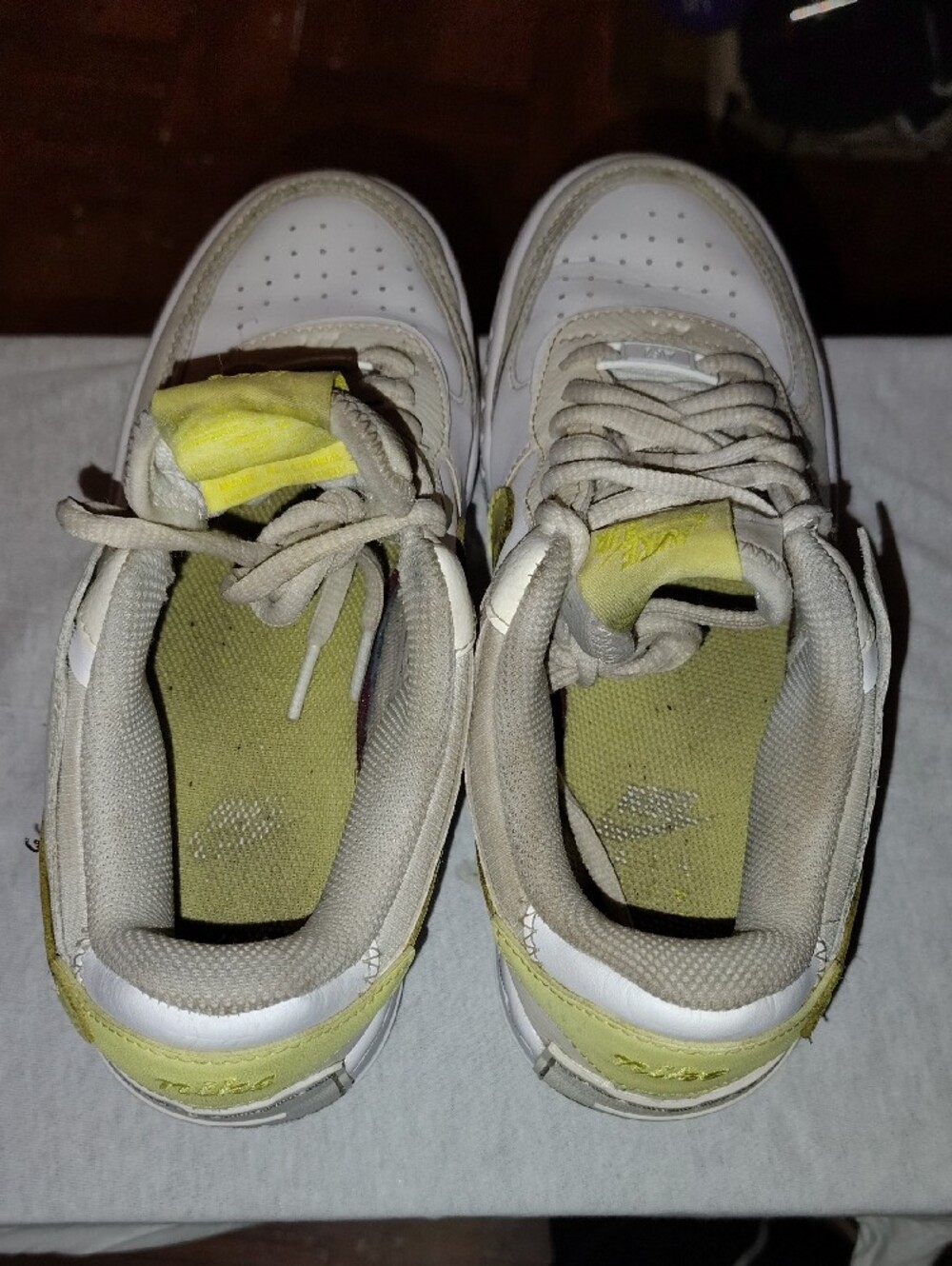 Nike White Sneakers with Pale Yellow Accents - Picture 4 of 9